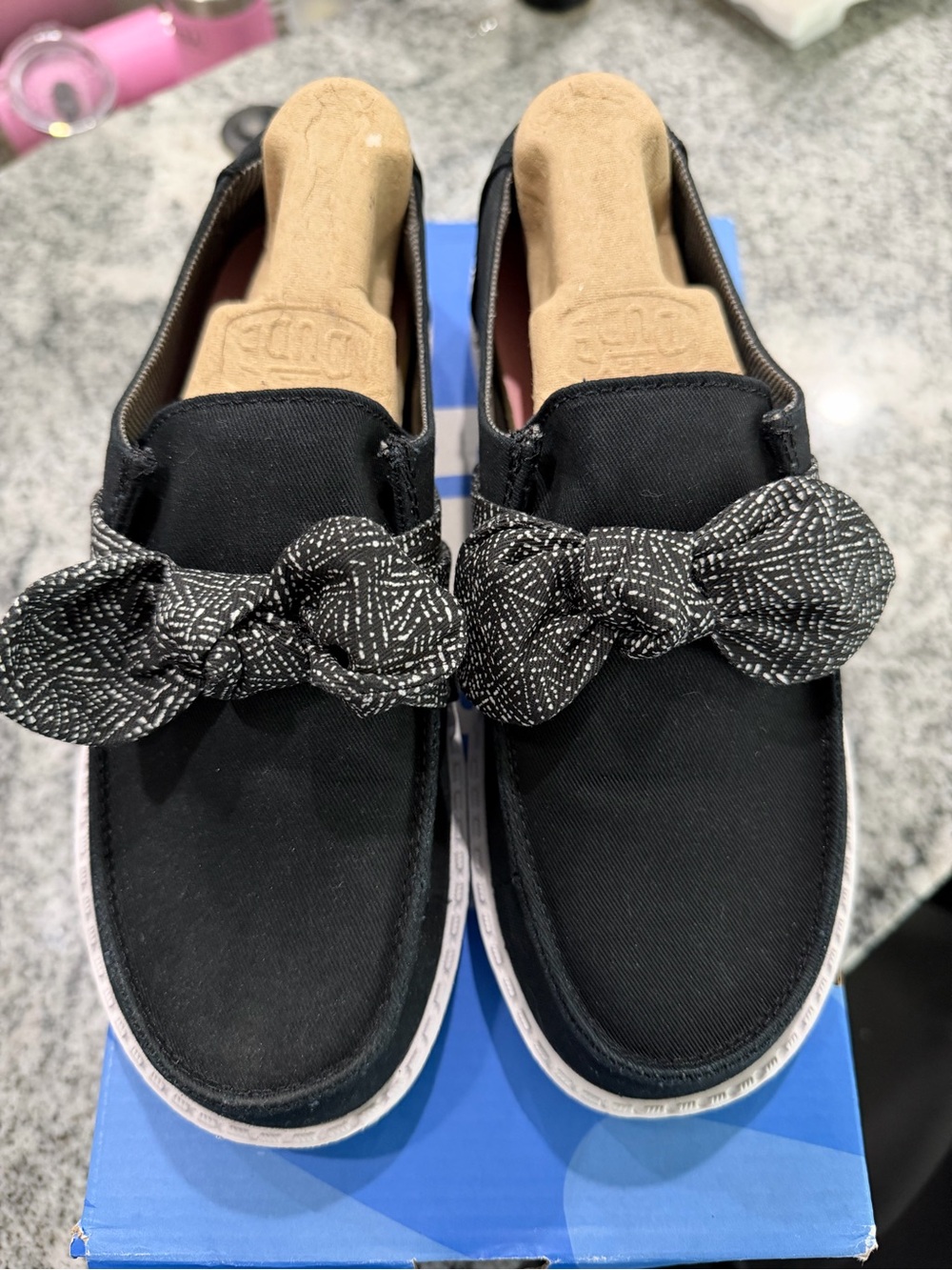 Hey Dude Black Slip-On Sneakers with Patterned Bow